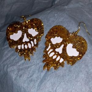 Golden skull earrings